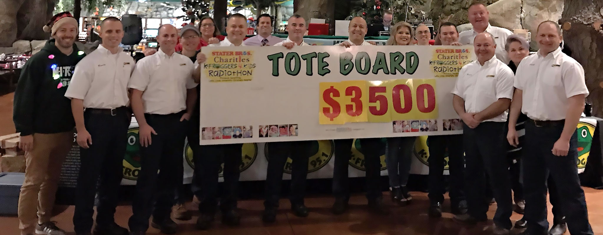 Les Schwab managers pose with Second Harvest Volunteers.