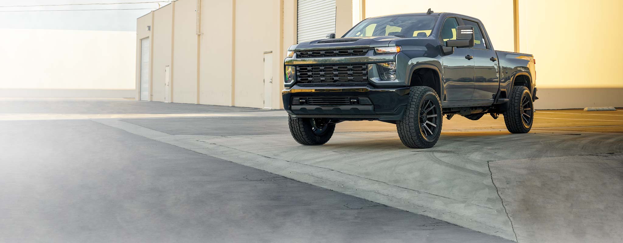 White pickup with a lift kit installed