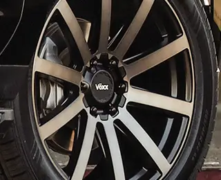 Black vehicle with Voxx Wheel